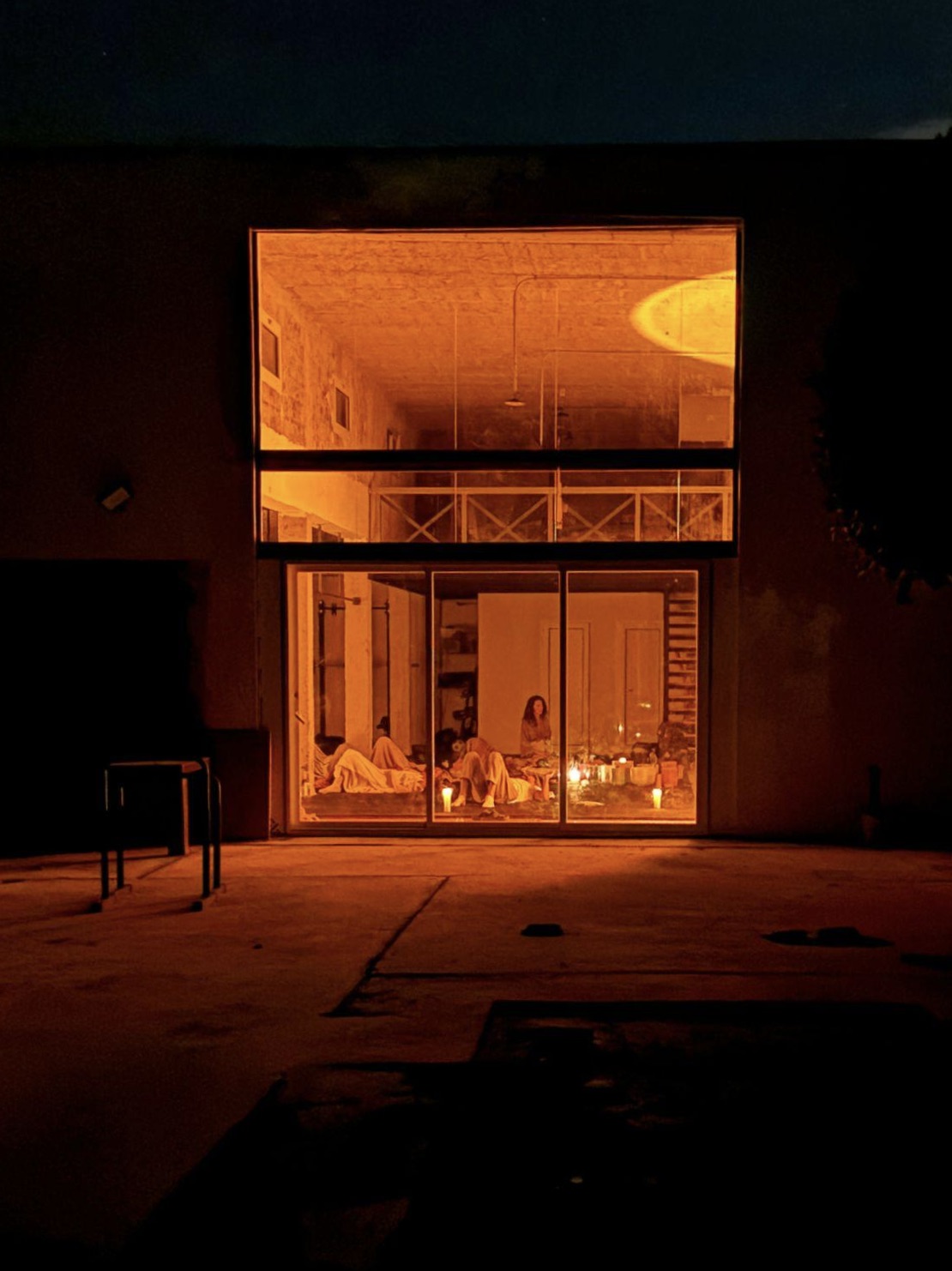 MA Ibiza, candlelit gathering in the space at night
